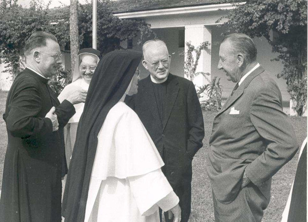 Mother Gerald Barry and Monsignor William Barry talk to Founders' Day event attendees